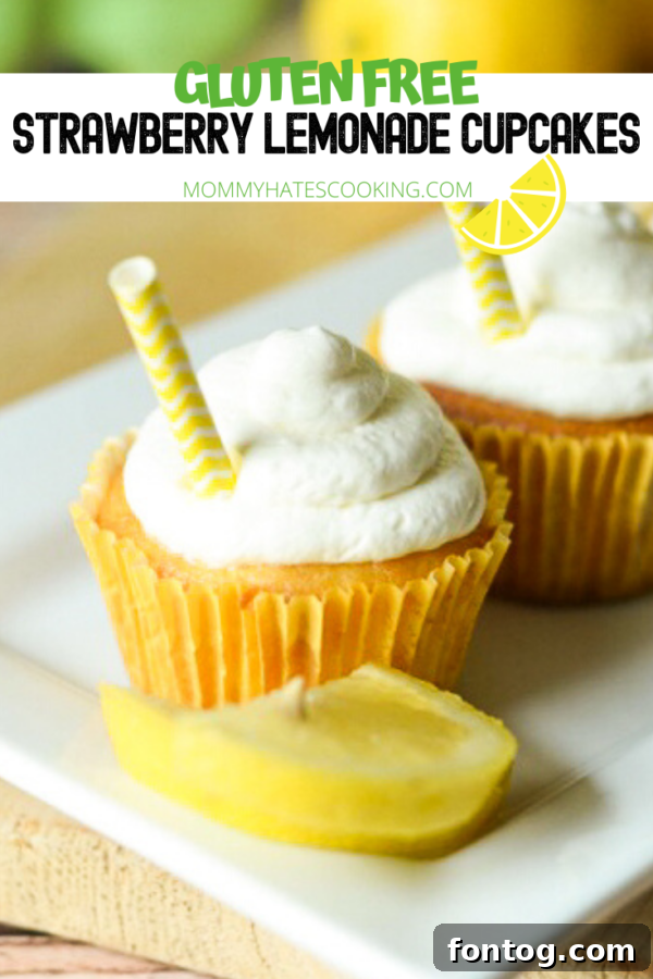 A vibrant display of Gluten-Free Strawberry Lemonade Cupcakes, showcasing their delicate topping and inviting appeal for a sweet treat.
