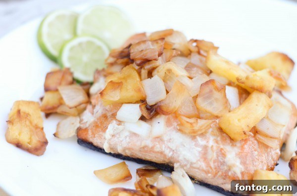 Vibrant Grilled Salmon with Tropical Pineapple Salsa 3 Close-up of fresh pineapple salsa ingredients, including diced pineapple, red onion, and cilantro.