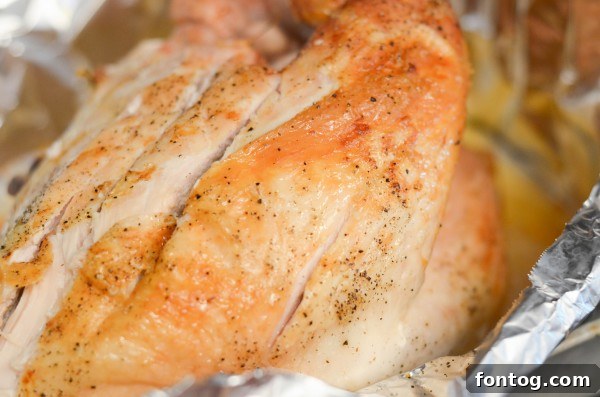 Bone-in turkey breast roasting in the oven, golden brown