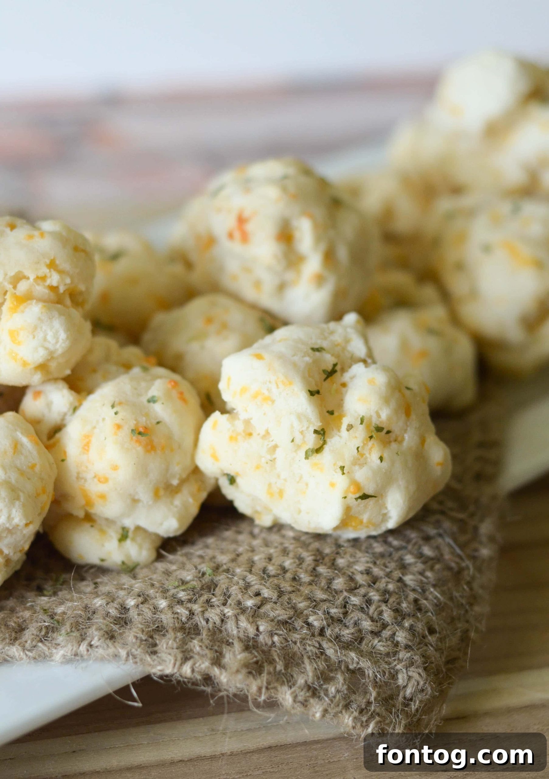 Gluten-Free Cheddar Bay Biscuits, showing a close-up of the finished product.