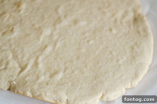 Gluten-Free All-Purpose Flour being measured for the fruit pizza recipe.