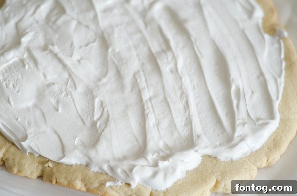A bowl of gluten-free cookie dough for fruit pizza.