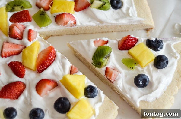 A freshly baked gluten-free sugar cookie crust, cooling on a rack.