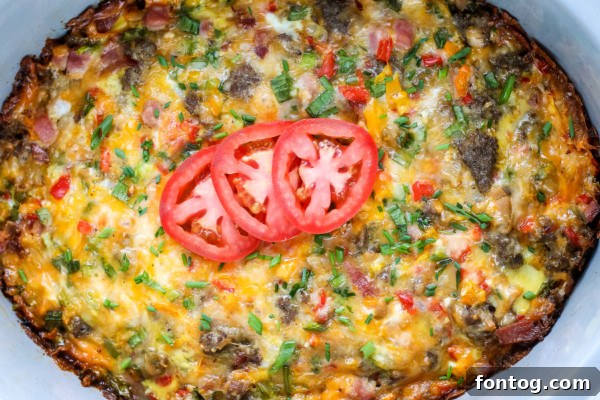A close-up of a large crockpot breakfast casserole, fresh out of the cooker