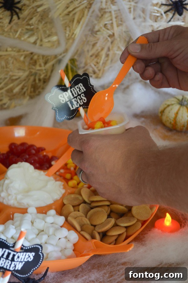 Spooktacularly Simple Mummy Dogs 3 Spooky Snack Pack Halloween Party Table with Pudding Cups