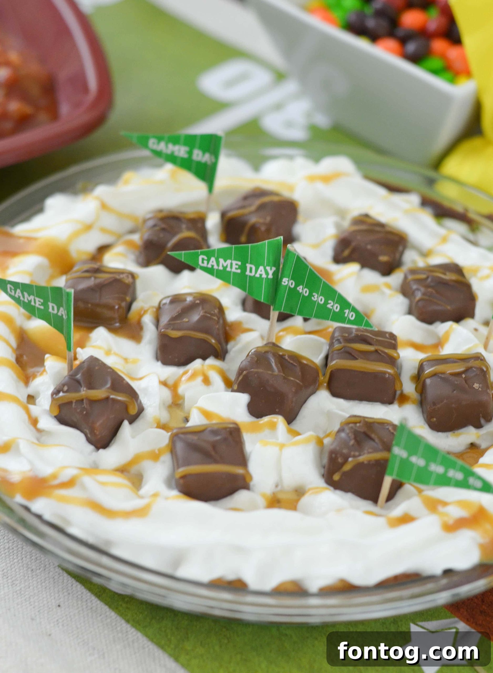 SNICKERS Cheesecake on a white plate