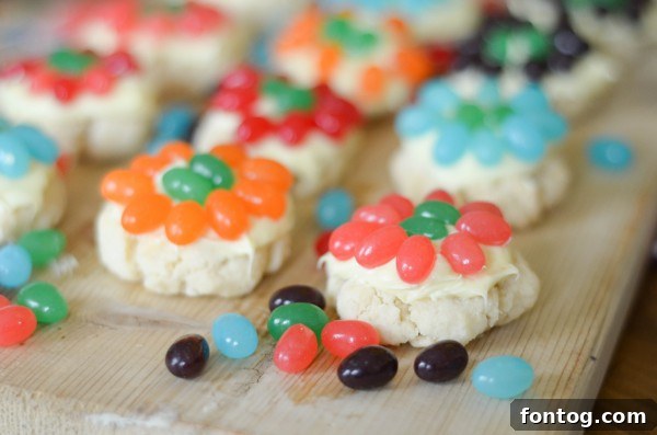 Individual Jelly Bean Flower Cookie with a vibrant green center, illustrating the simple yet effective decorating technique.