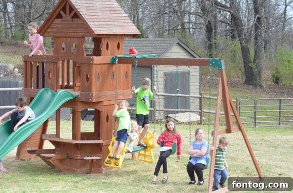 A toddler happily snacking on Gerber Lil' Beanies while looking out the car window.