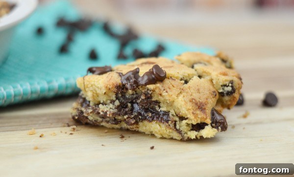 Ultimate Cookie Pie 3 Close-up of a warm deep dish chocolate chip cookie in a baking dish
