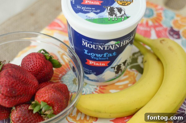 Refreshing Strawberry Banana Smoothie with fresh fruit garnish