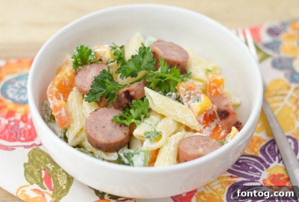 A large bowl of Chicken & Apple Sausage Pasta Bowls, ready to be served