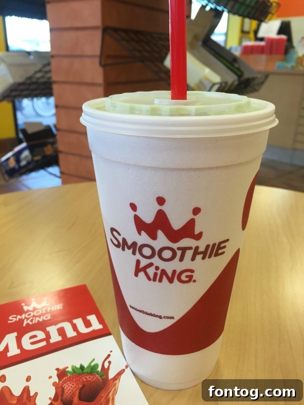 Smoothie King's vibrant Apple Kiwi Kale Smoothie, a delicious way to #BlendMoreVeggies for a healthy lifestyle.