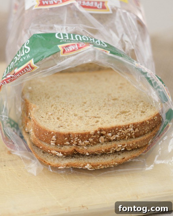 A close-up of Pepperidge Farm Harvest Blends bread, highlighting its whole grains and hearty crust.