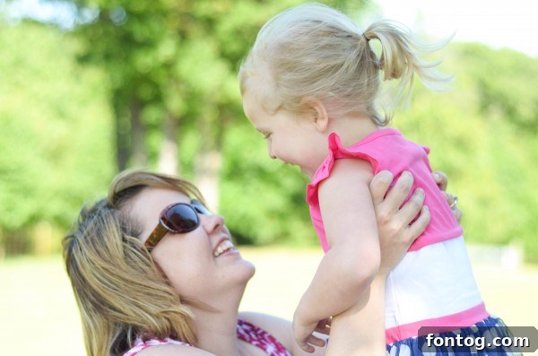 Mother and daughter hands together, symbolizing their strong bond during a special Minnie Me Moment. #MommyAndMe #MakingMemories