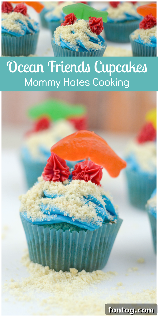 Ocean Friends Cupcakes - Close up of decorated cupcakes with blue frosting, crushed cookies, and Swedish Fish