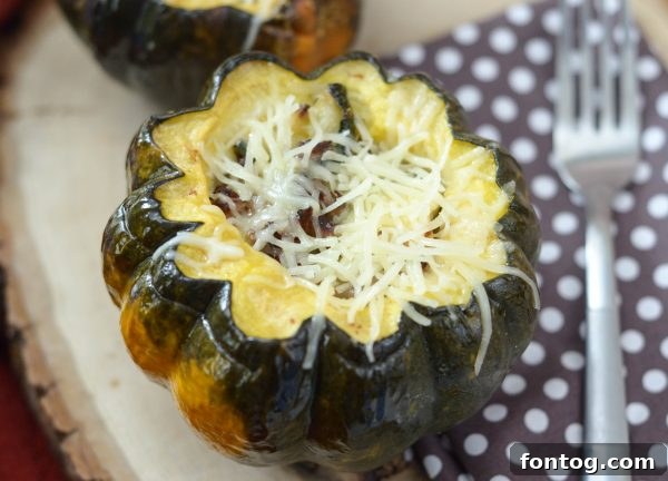 Golden Harvest Squash 3 Close-up of a perfectly baked Stuffed Acorn Squash on a wooden board
