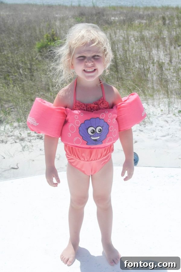 Kids having fun on a jet-ski during their Gulf Shores vacation