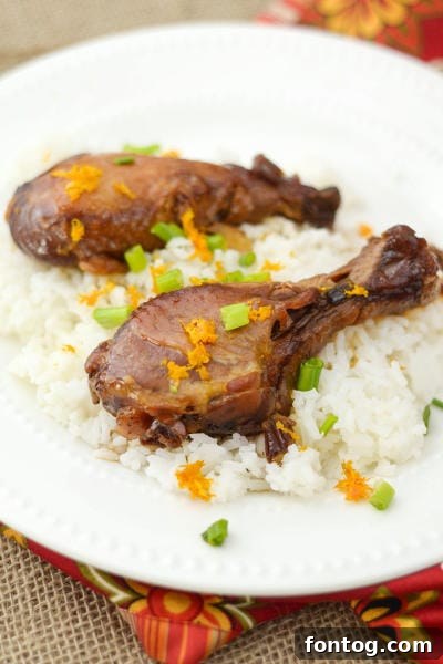 Delicious Slow Cooker Orange Chicken Ready to Serve with Garnish