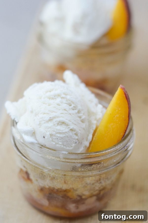Individual Peach Cobbler served in a mason jar