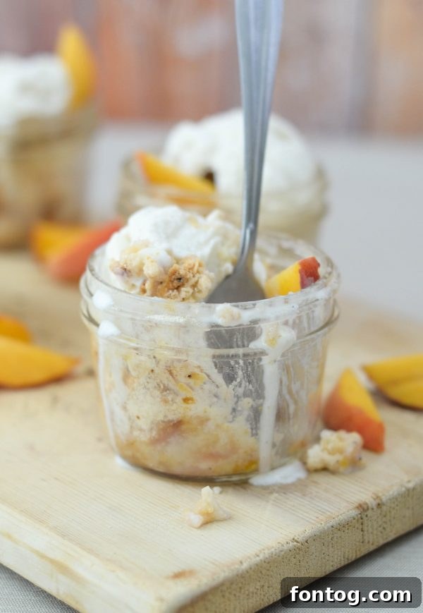 Warm Peach Cobbler in a Jar, ready to eat