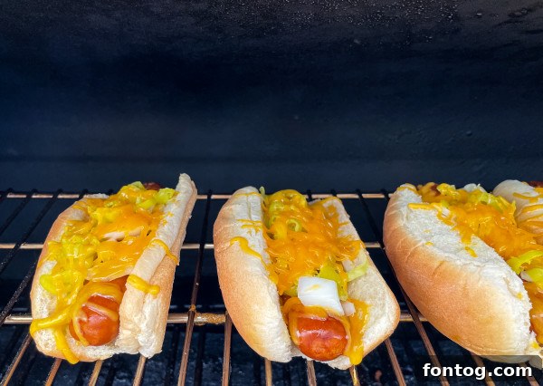Sausages cooking on a pellet grill