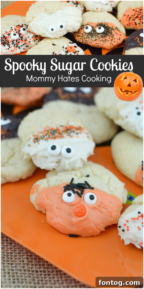 Spooky Sugar Cookies - A tray of Halloween-themed sugar cookies decorated with candy eyeballs and colorful sprinkles.