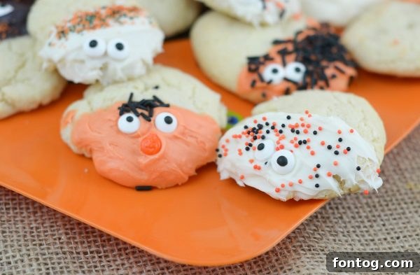 Spooky Sugar Cookies - A selection of cheerful, Halloween-themed sugar cookies ready for a party.