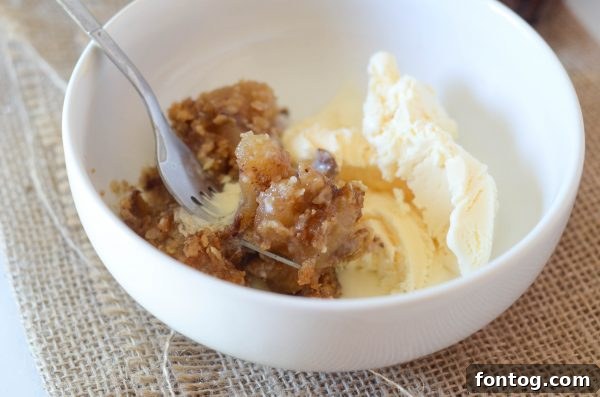 A close-up of the delicious crisp topping before baking, showing the oat and brown sugar mixture