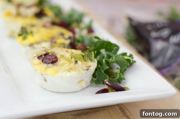Gourmet Sweet Kale Egg Bites 4 Close-up of Sweet Kale Omelets baking in a muffin pan