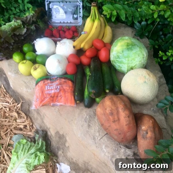 Basket of fresh produce including sweet potatoes