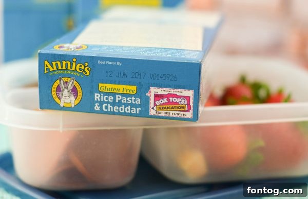 Close-up of a grocery cart featuring Annie's organic snacks, demonstrating how everyday purchases at Sprouts can contribute to Box Tops for Education.