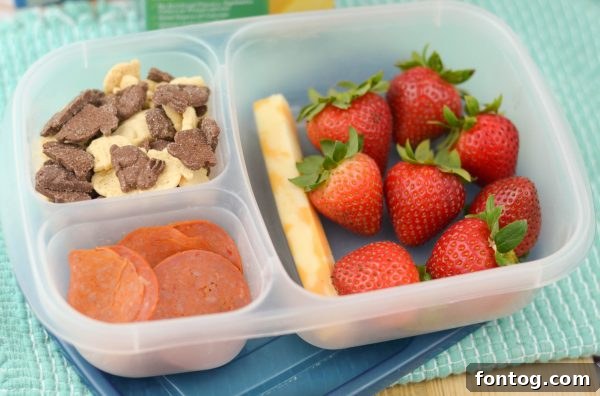 A parent organizing various lunchbox items, including Box Tops eligible snacks, demonstrating efficient back-to-school preparation and smart shopping at Sprouts.