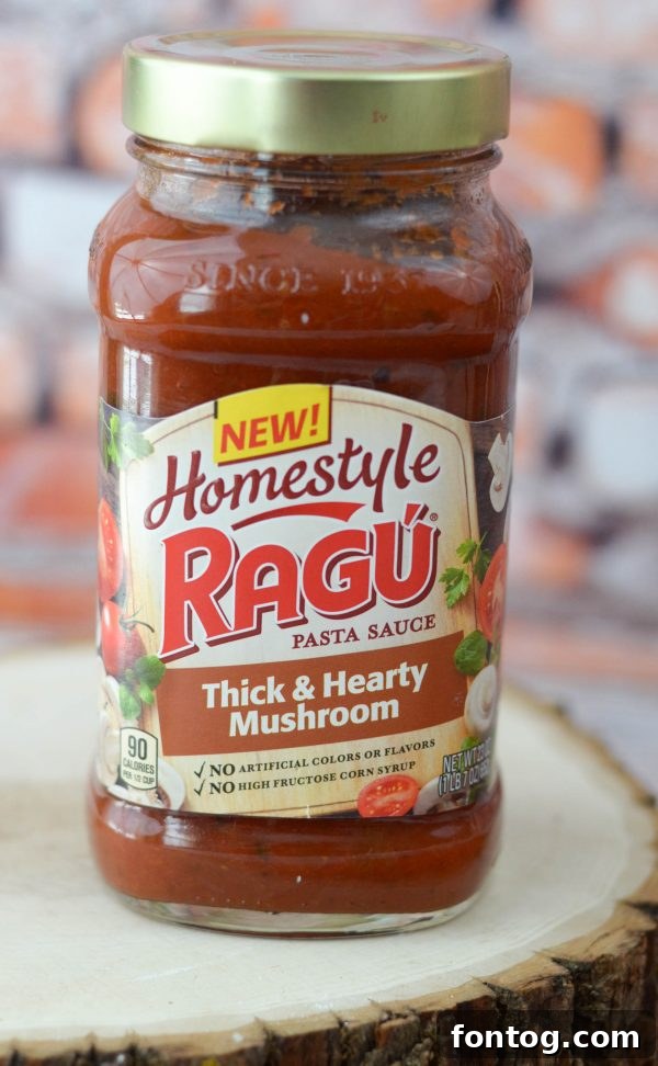 Ready to serve: Baked Zoodles & Meatballs, garnished with fresh parsley.