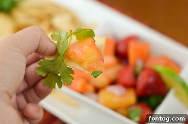 Serving Tropical Fruit Salsa with pita chips