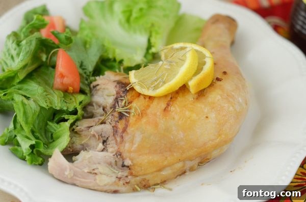 Cooked Rosemary Vinaigrette Chicken with fresh rosemary garnish