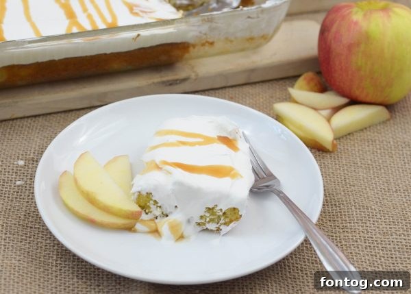 Delicious Caramel Apple Cake with a drizzle of caramel sauce
