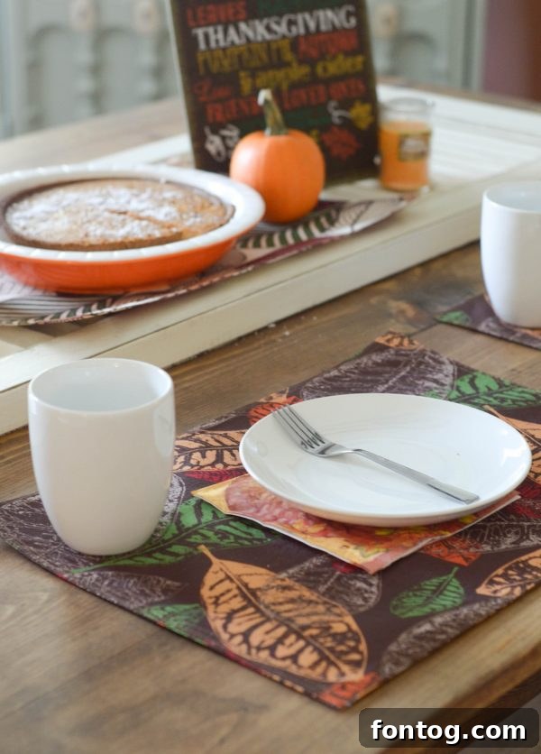 5 Essential Dinner Party Hacks 3 Close-up of a rustic fall-themed table setting with Dollar General plates, napkins, and a centerpiece, ready for a party.