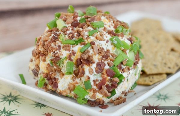Serving Bacon Ranch Cheese Ball with various crackers and fresh vegetables