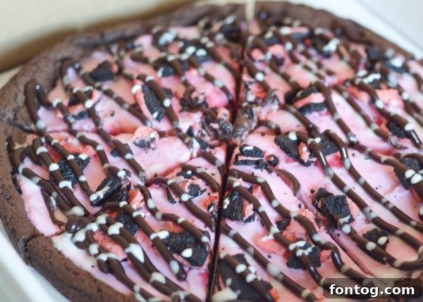 Festive Baskin-Robbins Ganache Poinsettia Cake with holiday decor