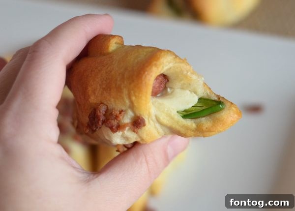 Savory Sausage and Pepper Pastries 4 Baked Sausage Pepper Rolls on a platter