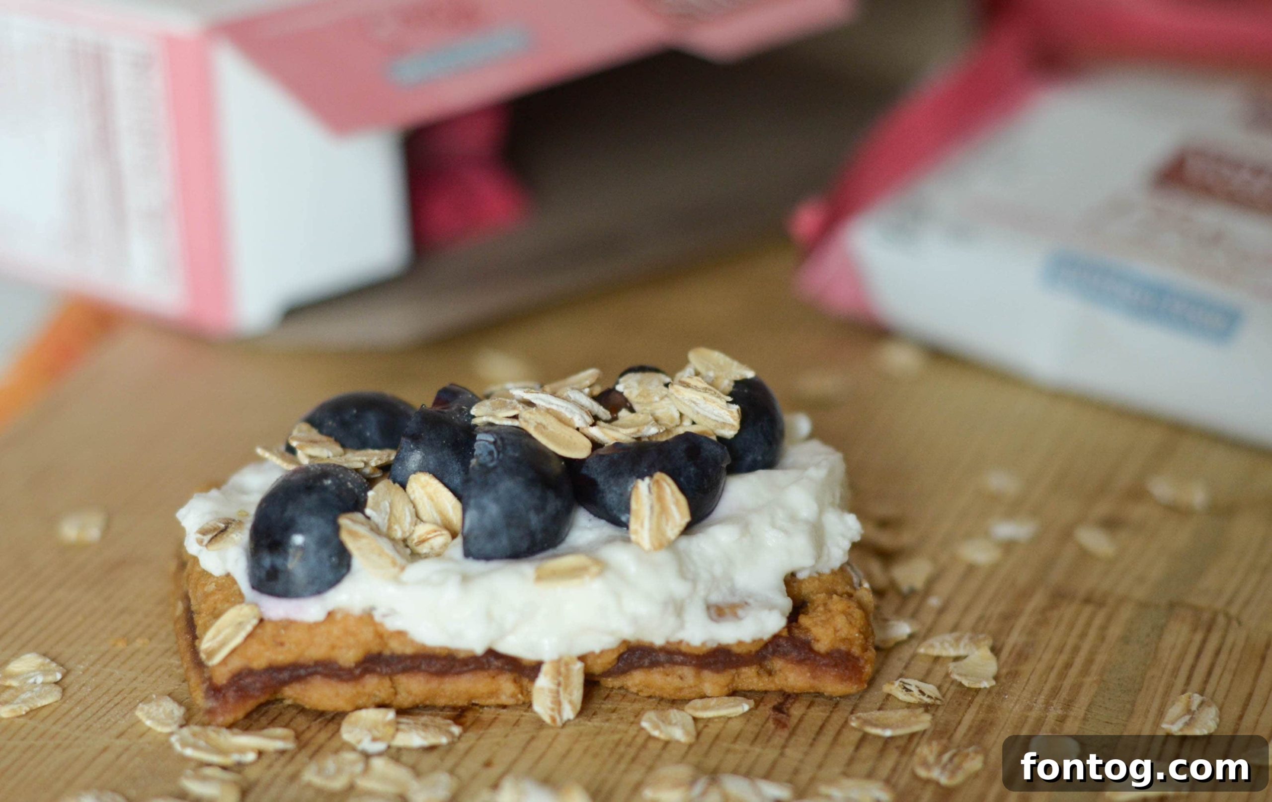 A beautifully presented Fruit Topped Strawberry & Peanut Butter Bar, ready to be enjoyed