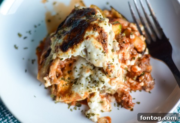eggplant lasagna served with a fresh green salad