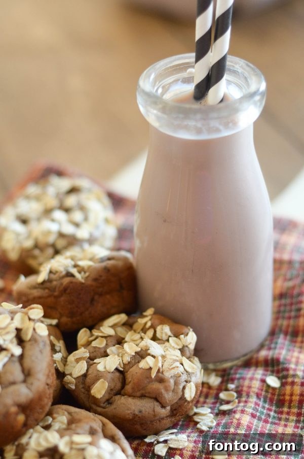 A delightful duo of Chocolate Banana Muffins paired perfectly with a glass of refreshing TruMoo Chocolate Milk.