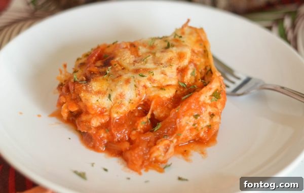 Wholesome Chicken Parmesan with Spaghetti Squash 5 A dish of Chicken Parmesan with Spaghetti Squash, showing the tender chicken and spaghetti-like strands