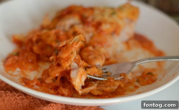 Wholesome Chicken Parmesan with Spaghetti Squash 6 A large serving of Chicken Parmesan with Spaghetti Squash in a casserole dish