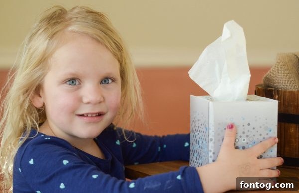 Close-up of Kleenex Anti-Viral tissue box, highlighting its germ-fighting properties