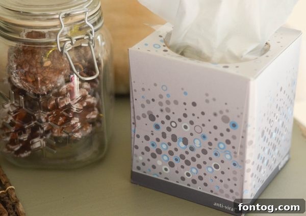 Family discussing cold and flu prevention strategies, including Kleenex Anti-Viral