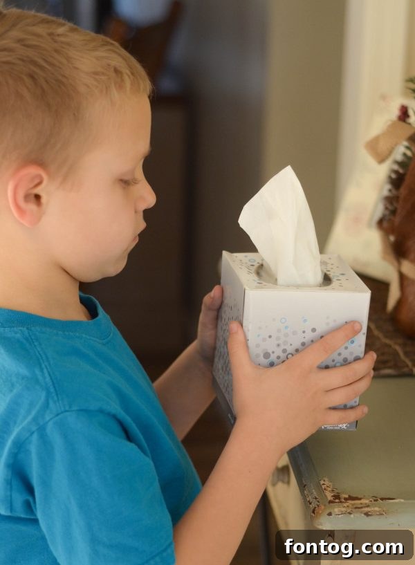 A box of Kleenex Anti-Viral tissues positioned prominently on a counter