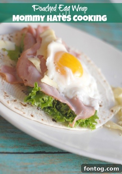 A healthy Poached Egg Wrap, filled with greens and a soft poached egg.