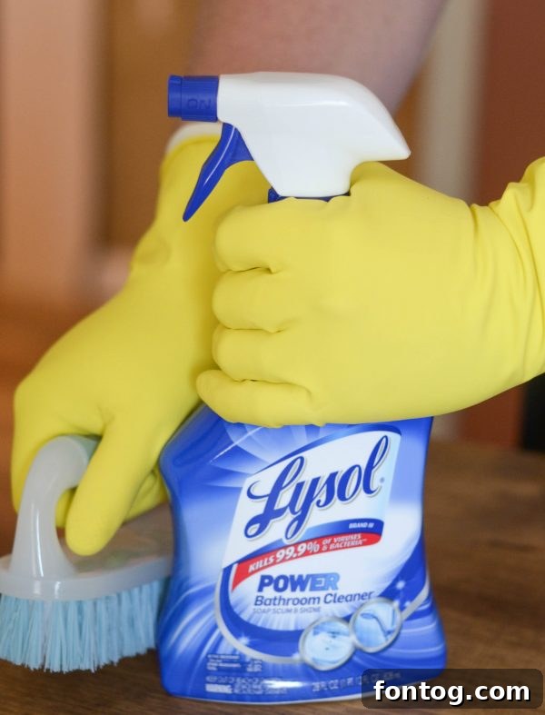 Lysol products neatly organized in a cleaning caddy, ready for action.